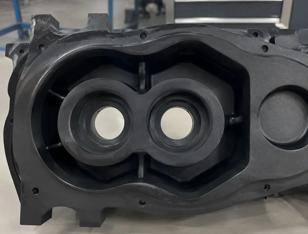 Finished coated A356 die-cast equipment housing viewed from the front