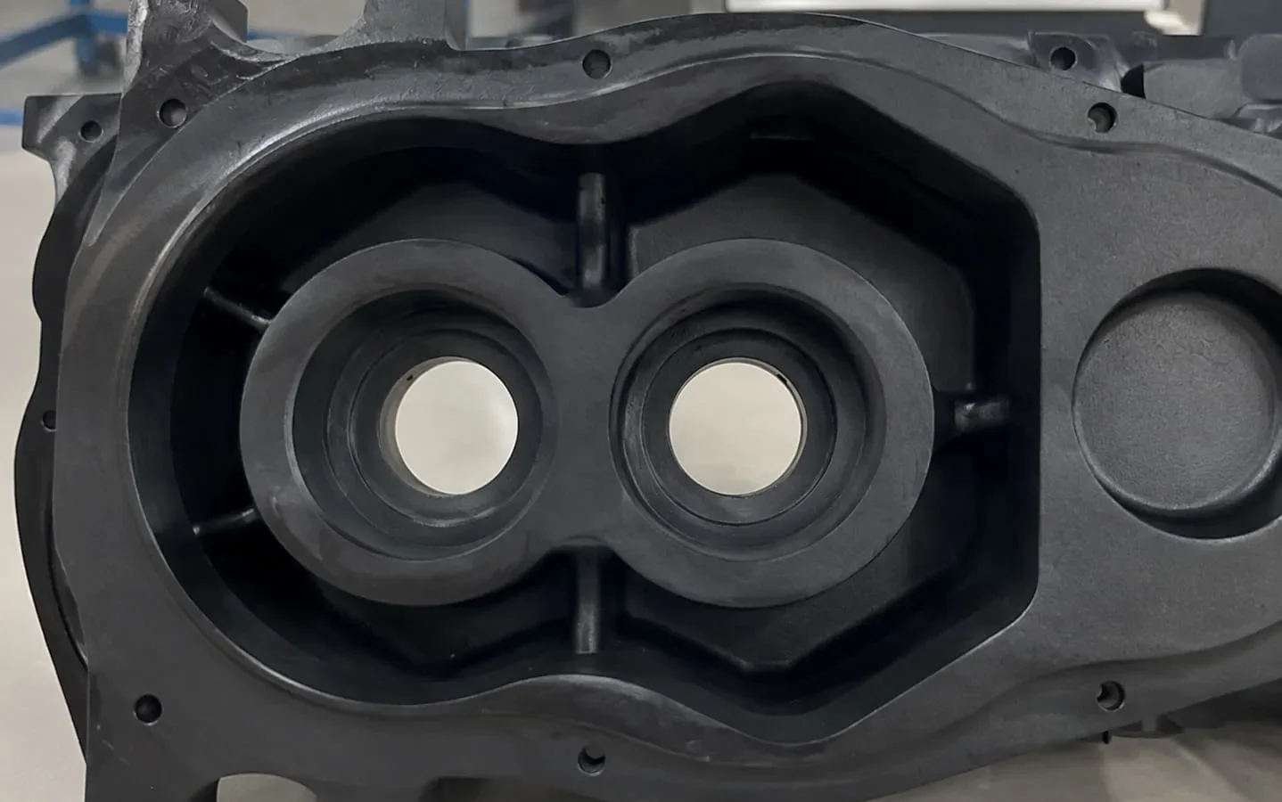 Finished coated A356 die-cast equipment housing viewed from the front