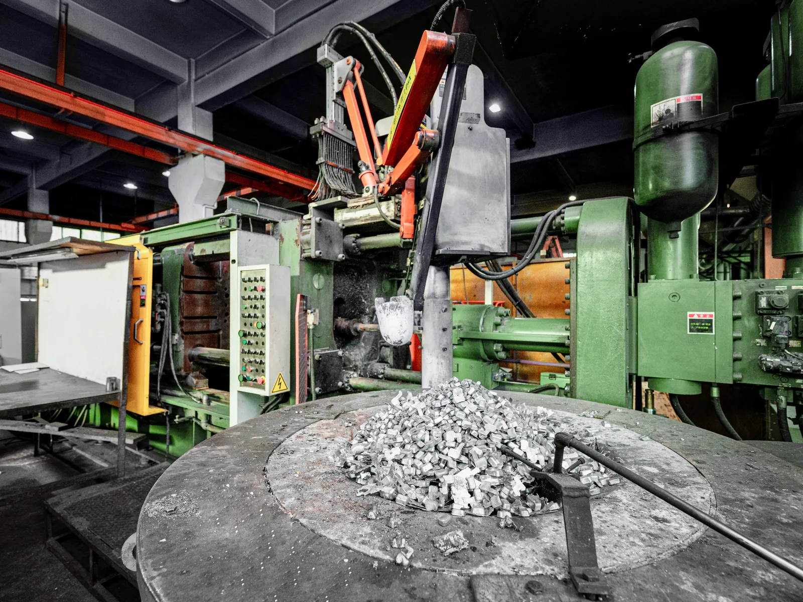 Industrial die casting machine during component production