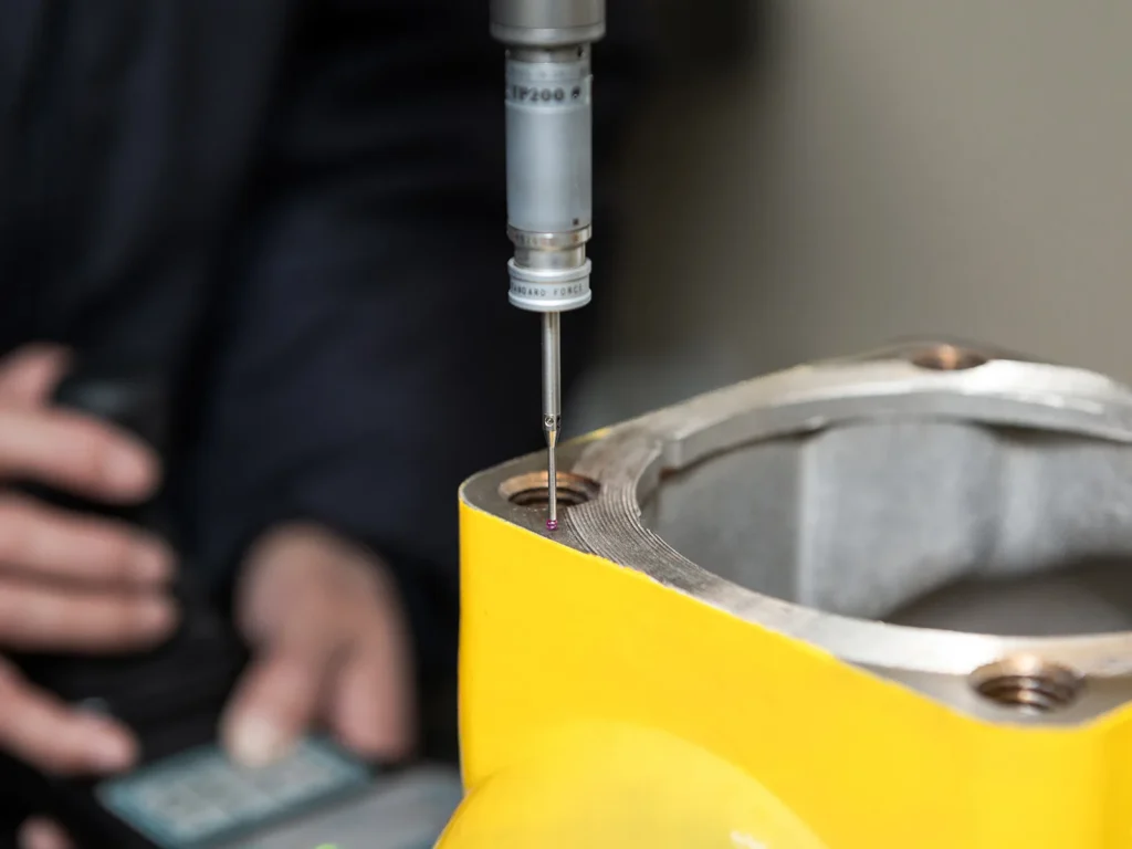 Dimensional inspection of a machined investment cast component